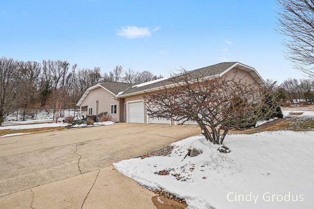 8079 Pigeon Creek Drive, West Olive, MI 49460