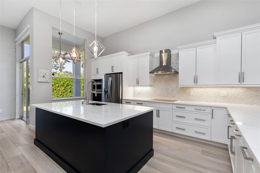 Image 12 of property listing at 7685 NW 71st Terrace, Parkland, FL 33067