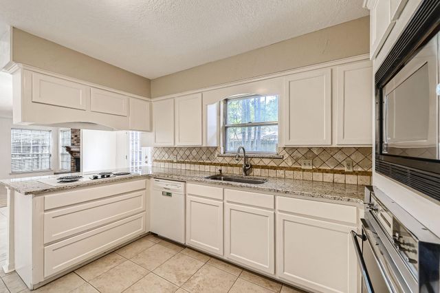 19527 Enchanted Oaks Drive, Spring, TX 77388