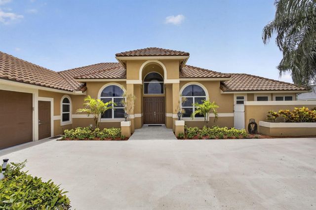8030 Woodsmuir Drive, Palm Beach Gardens, FL 33412