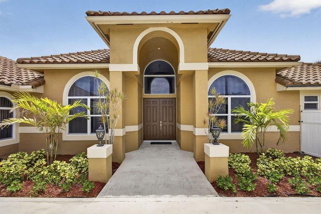 8030 Woodsmuir Drive, Palm Beach Gardens, FL 33412