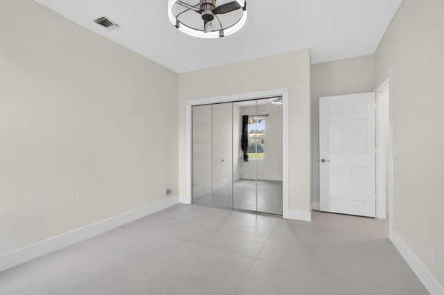 8030 Woodsmuir Drive, Palm Beach Gardens, FL 33412