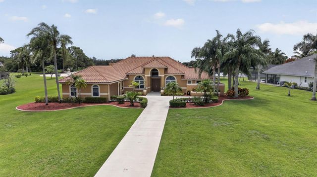 8030 Woodsmuir Drive, Palm Beach Gardens, FL 33412