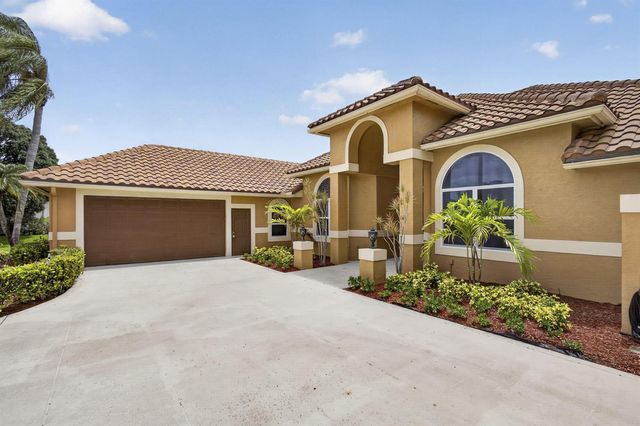 8030 Woodsmuir Drive, Palm Beach Gardens, FL 33412