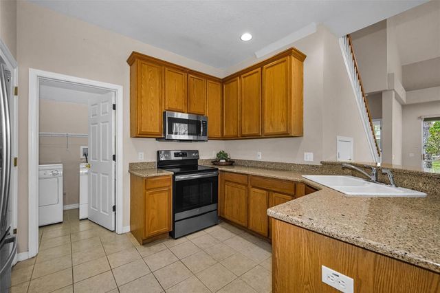 3304 COVERED BRIDGE DRIVE E, Dunedin, FL 34698