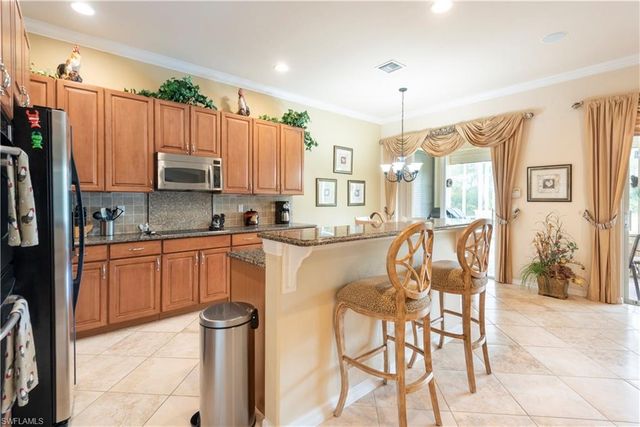 5725 Lago Villaggio WAY, Naples, FL 34104