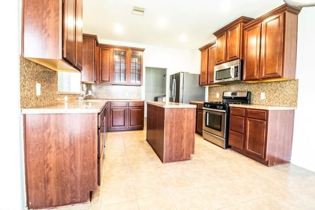 21218 Branchport Drive, Houston, TX 77095