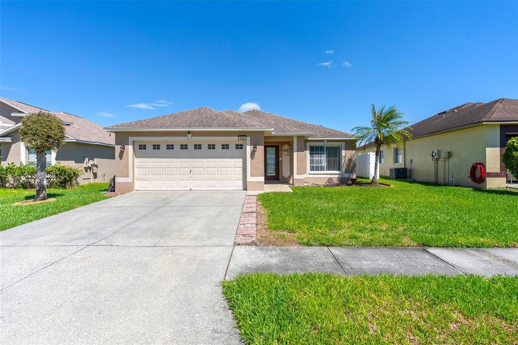 Image 1 of property listing at 1424 OCEAN REEF ROAD, Wesley Chapel, FL 33544