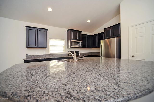 1033 Musgrass Circle, West Melbourne, FL 32904