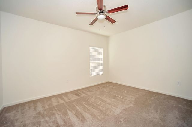 1033 Musgrass Circle, West Melbourne, FL 32904