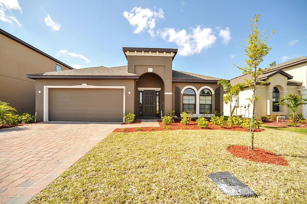 1033 Musgrass Circle, West Melbourne, FL 32904