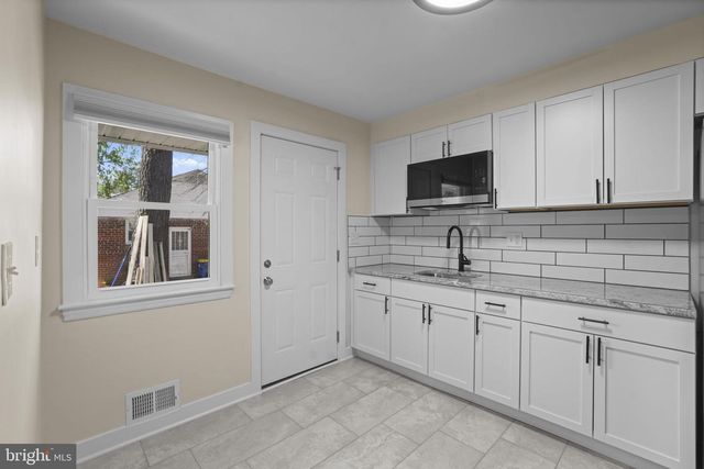 8405 RAVENSWOOD, New Carrollton, MD 20784