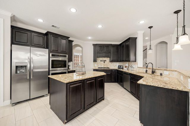 9338 Taylor Cliff Lane, Cypress, TX 77433