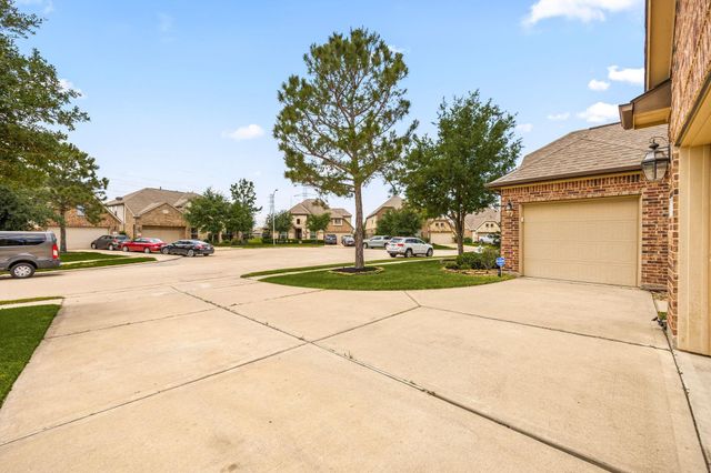 9338 Taylor Cliff Lane, Cypress, TX 77433