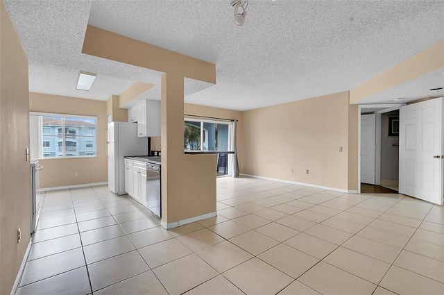 9645 NW 1st Court 1-210, Pembroke Pines, FL 33024