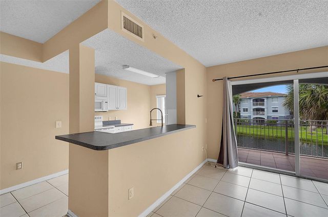 9645 NW 1st Court 1-210, Pembroke Pines, FL 33024