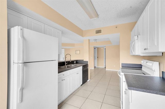 9645 NW 1st Court 1-210, Pembroke Pines, FL 33024