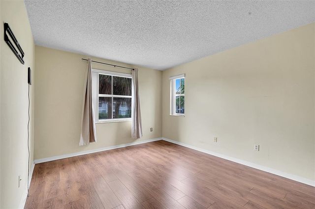 9645 NW 1st Court 1-210, Pembroke Pines, FL 33024