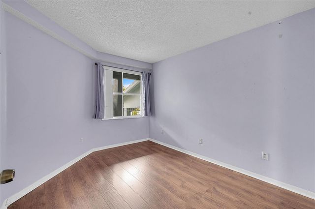 9645 NW 1st Court 1-210, Pembroke Pines, FL 33024