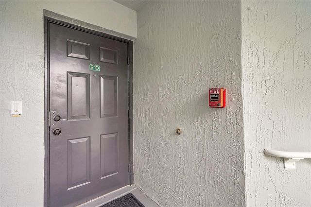 9645 NW 1st Court 1-210, Pembroke Pines, FL 33024