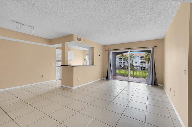 9645 NW 1st Court 1-210, Pembroke Pines, FL 33024