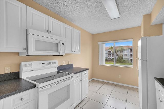 9645 NW 1st Court 1-210, Pembroke Pines, FL 33024