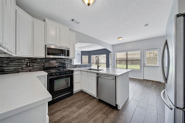 12802 Point Aquarius Boulevard, Willis, TX 77318