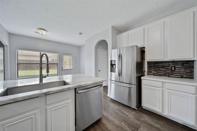 12802 Point Aquarius Boulevard, Willis, TX 77318