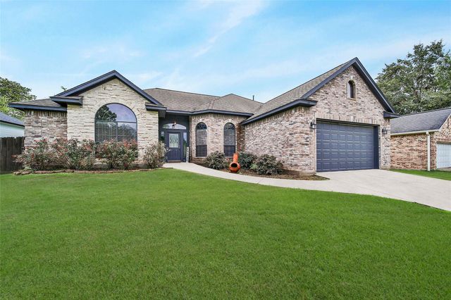 12802 Point Aquarius Boulevard, Willis, TX 77318
