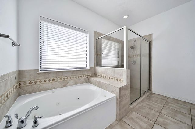 12802 Point Aquarius Boulevard, Willis, TX 77318