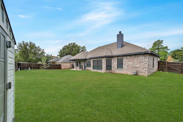 12802 Point Aquarius Boulevard, Willis, TX 77318