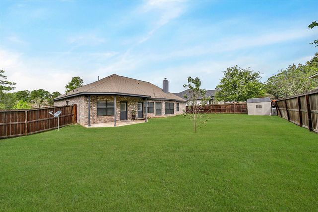 12802 Point Aquarius Boulevard, Willis, TX 77318