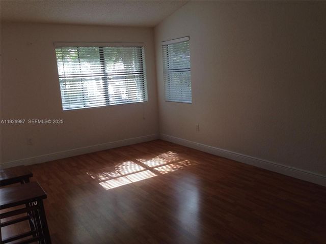 15689 SW 106th Ln 702, Miami, FL 33196