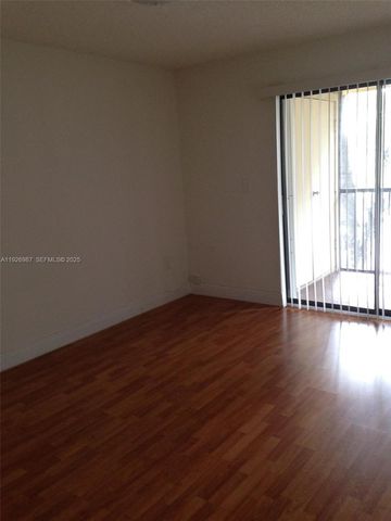 15689 SW 106th Ln 702, Miami, FL 33196