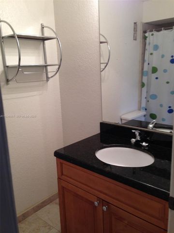 15689 SW 106th Ln 702, Miami, FL 33196