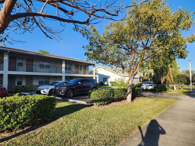 8705 NW 38th Drive 7b, Coral Springs, FL 33065