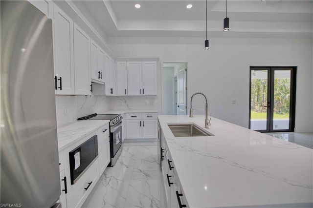 906 Greenwood AVE W, Lehigh Acres, FL 33972