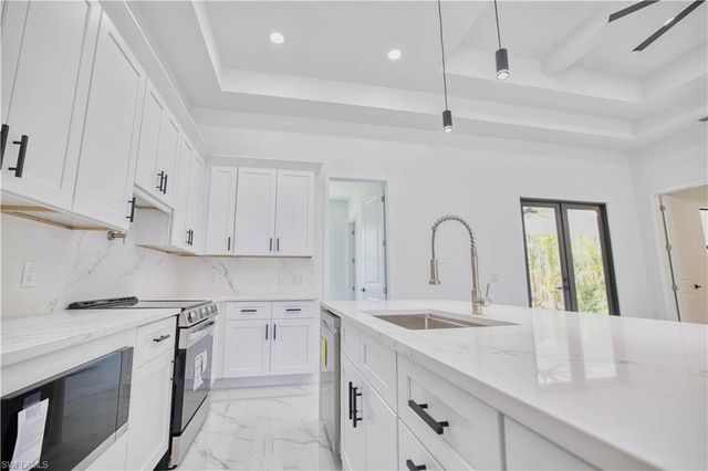 906 Greenwood AVE W, Lehigh Acres, FL 33972