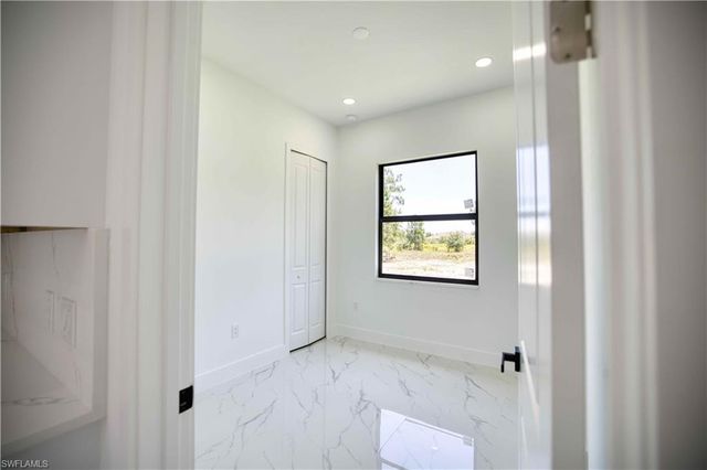 906 Greenwood AVE W, Lehigh Acres, FL 33972