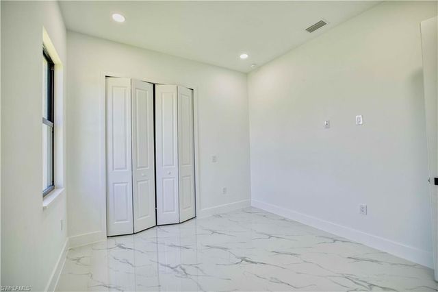 906 Greenwood AVE W, Lehigh Acres, FL 33972