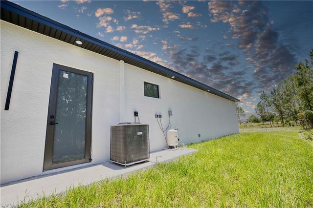 906 Greenwood AVE W, Lehigh Acres, FL 33972