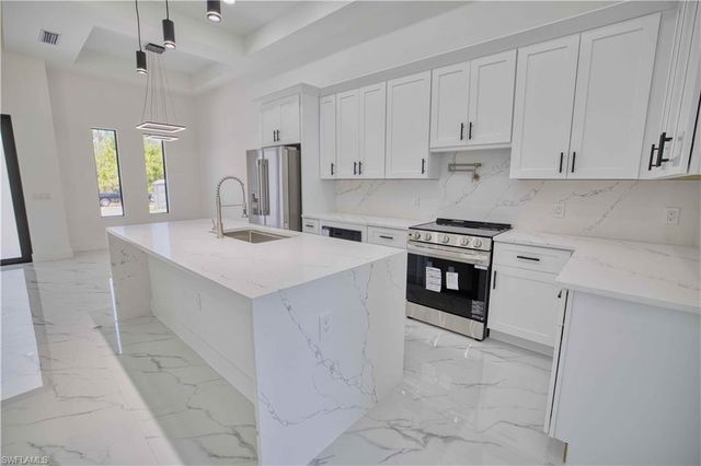 906 Greenwood AVE W, Lehigh Acres, FL 33972
