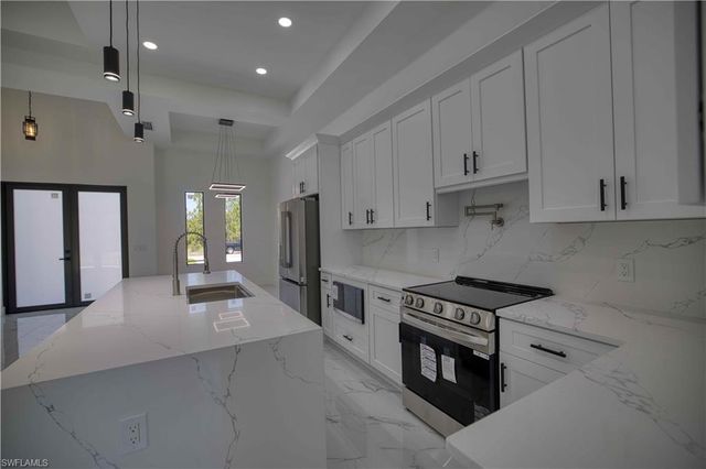 906 Greenwood AVE W, Lehigh Acres, FL 33972