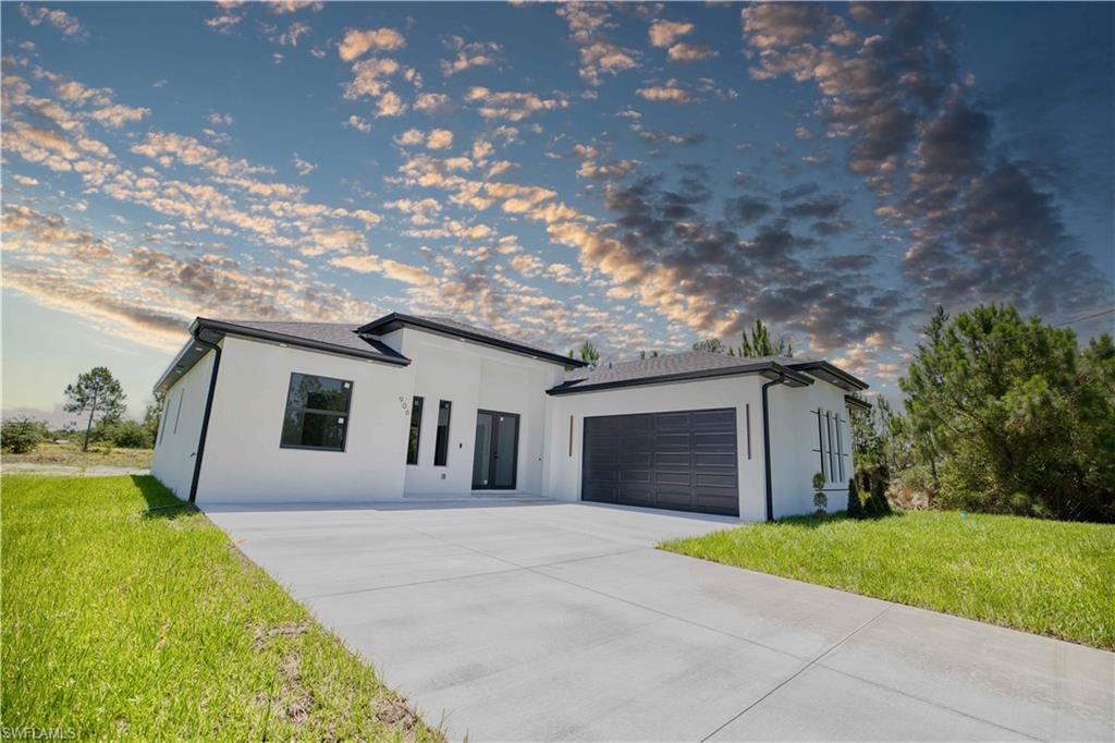 906 Greenwood AVE W, LEHIGH ACRES, FL 33972 — photo 2