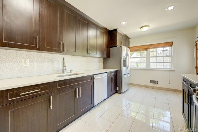 55 Duncan Drive W, Westbury, NY 11590