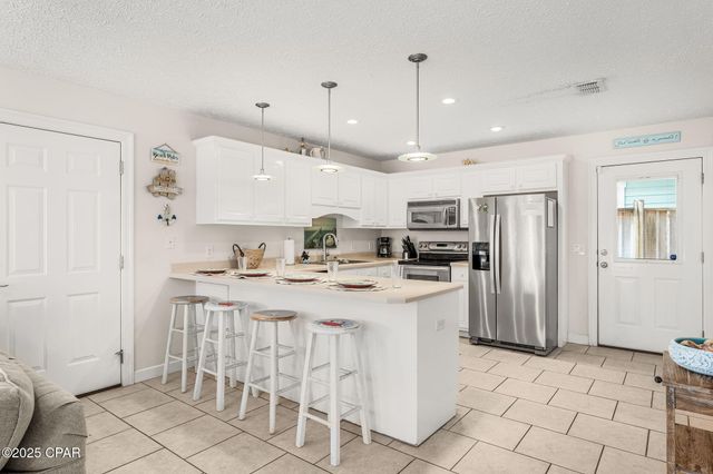 303 La Paloma Place, Panama City Beach, FL 32413