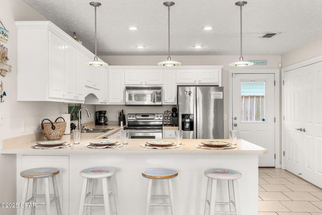 303 La Paloma Place, Panama City Beach, FL 32413