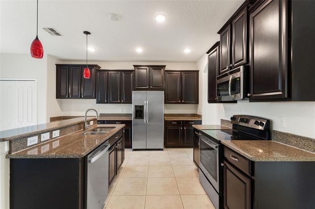 1315 MOSS CREEK LN, Davenport, FL 33896