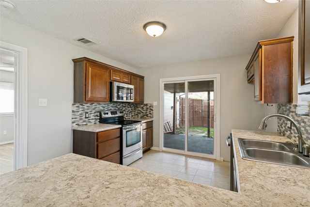 1712 E Peters Colony Road, Carrollton, TX 75007