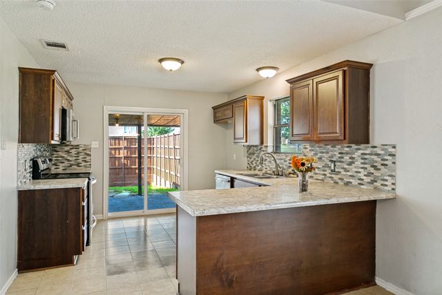 1712 E Peters Colony Road, Carrollton, TX 75007